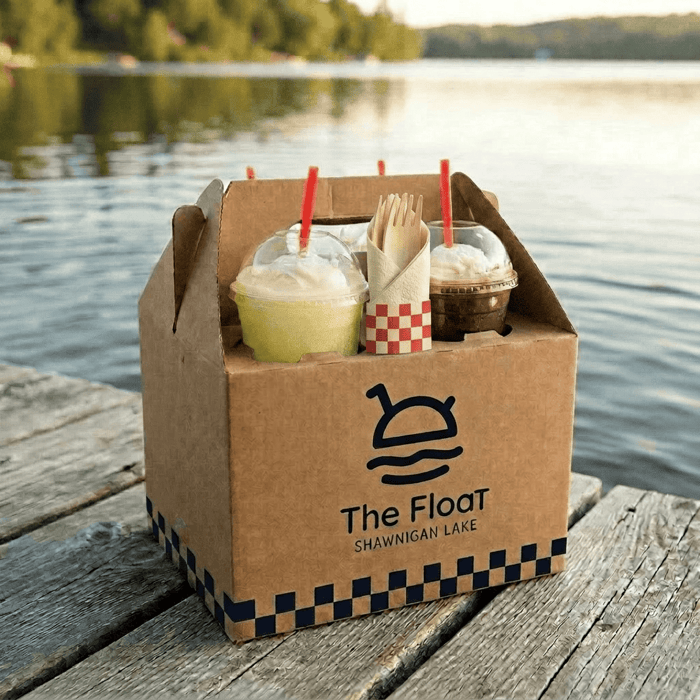 The Beach Bach box on the dock at Shawnigan Lake, with floats in the drink holder